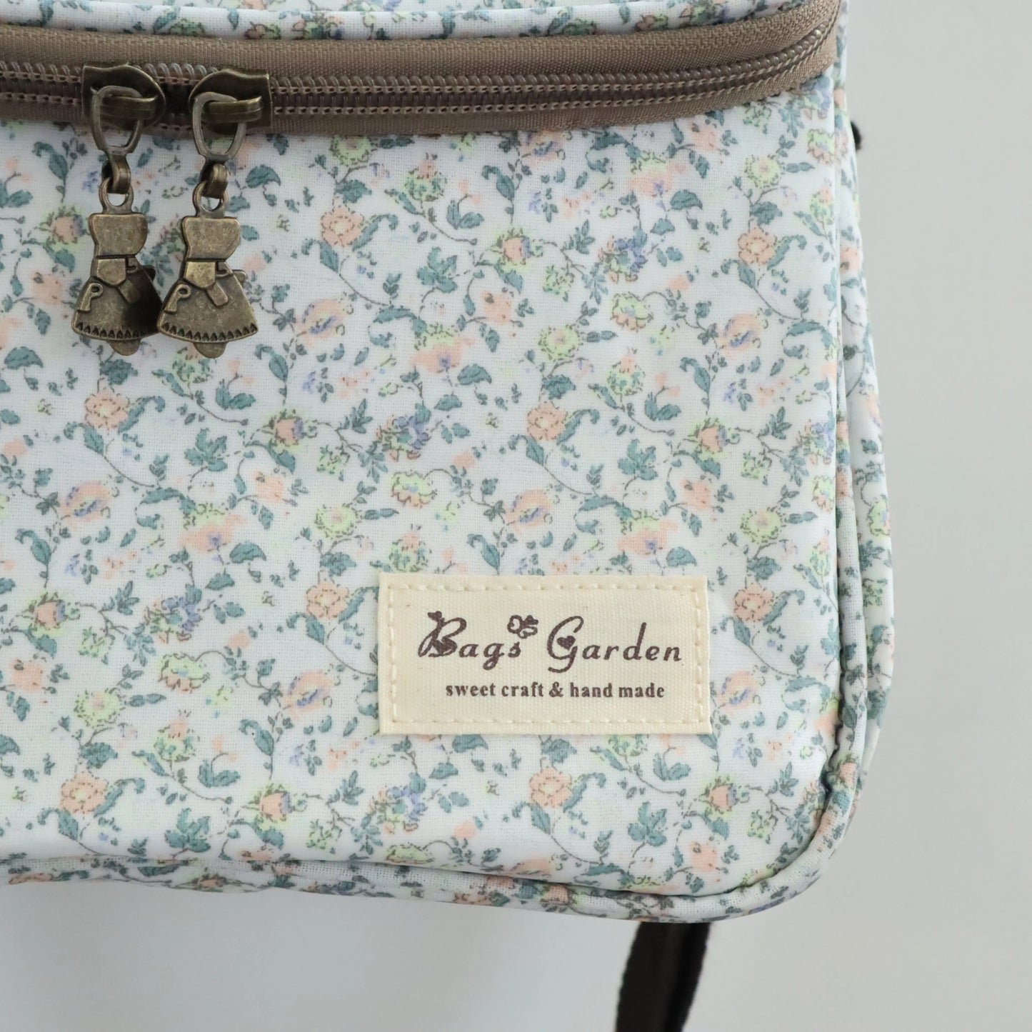 Nevera ovalada impermeable Mango Bags Garden